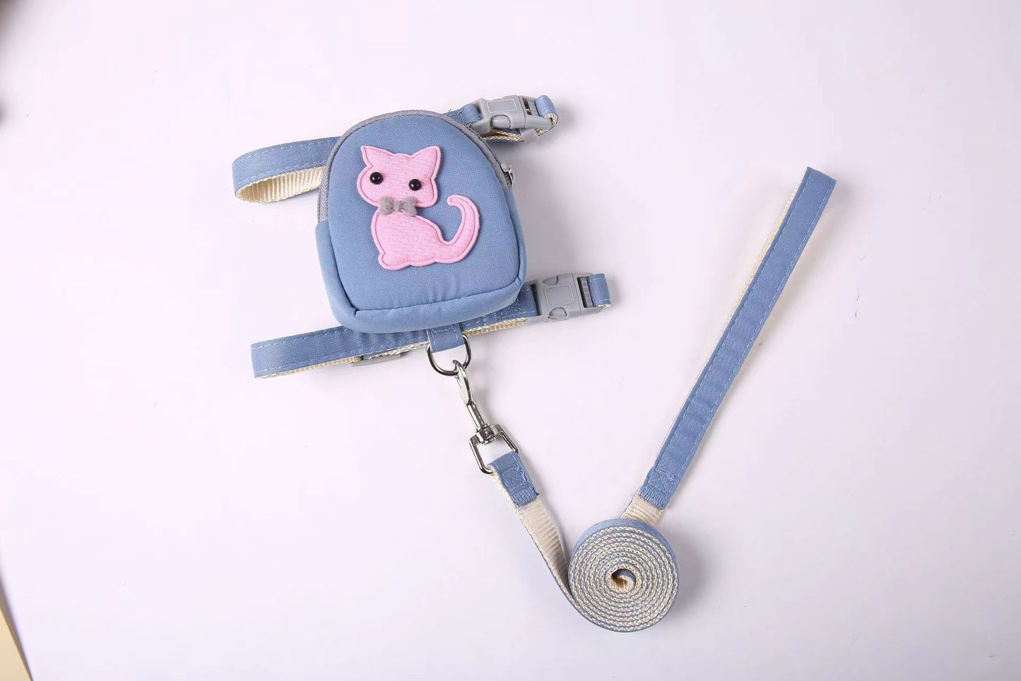 Adorable small dog and cat harness with a built-in backpack
